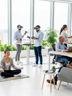 Employees enjoying modern non-traditional benefits in a contemporary office setting.
