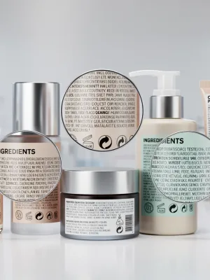 Detailed cosmetic product labels under scrutiny, representing new FDA regulations