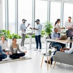 Employee Perks 2026: Top 7 Non-Traditional Benefits Deep Dive Employees enjoying modern non-traditional benefits in a contemporary office setting.