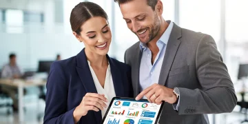 Professionals reviewing employer benefits for maximum savings