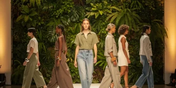 Models on a runway wearing sustainable fashion, organic fabrics